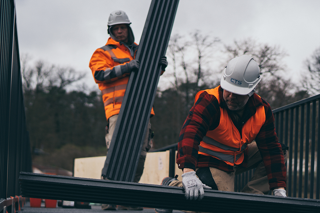 Glass fiber reinforced plastic planks as bridge decking